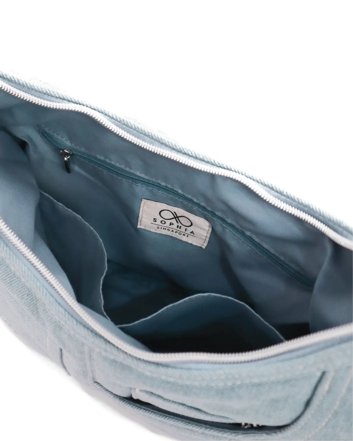 SIGNATURE POCKET HOBO BAG IN LIGHT WASH DENIM TSL Singapore