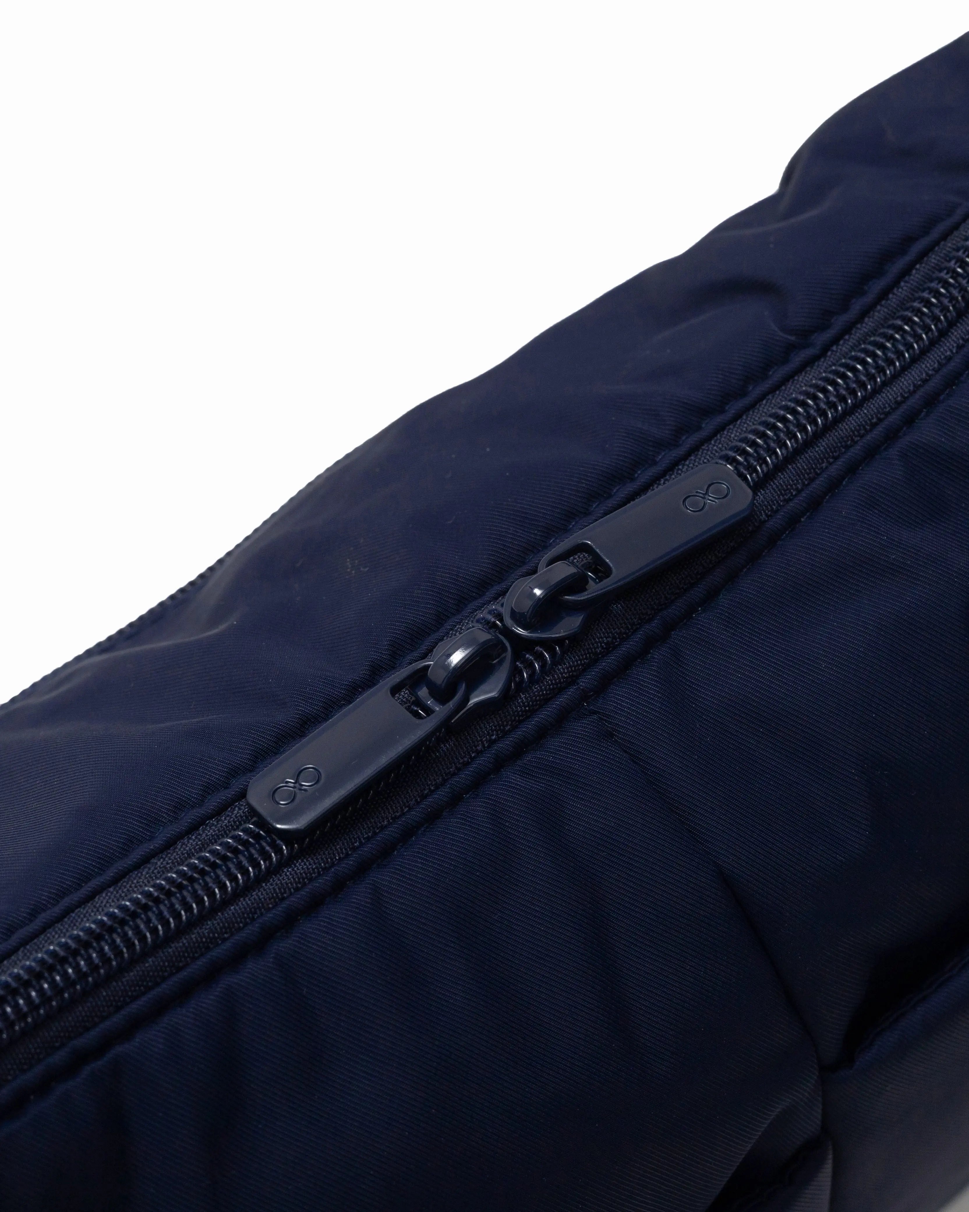 MINI SIGNATURE POCKET CROSSBODY BAG IN POSH MIDNIGHT