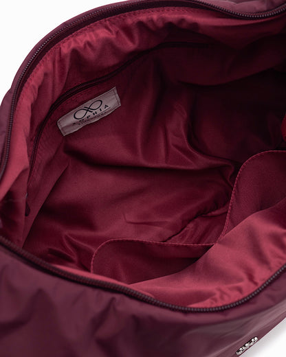 XL POSH CRESCENT BAG IN WINE