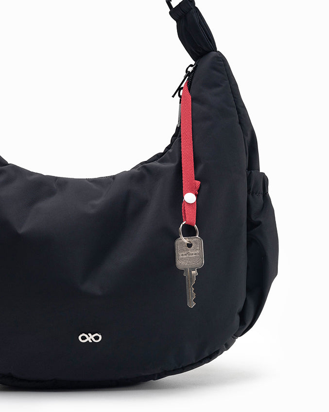 L POSH CRESCENT BAG IN JET BLACK