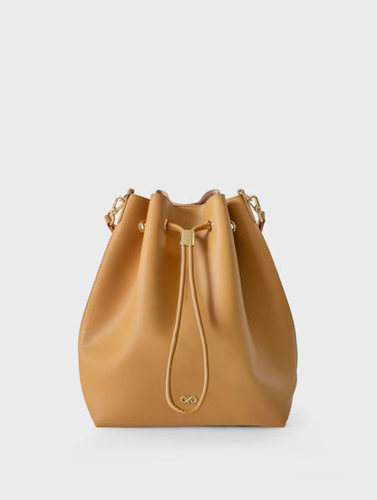 REINA MAGIC BUCKET BAG IN CAMEL